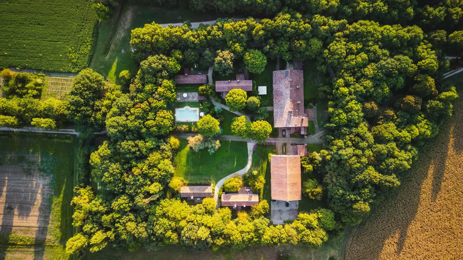 Aerial view of a large property with multiple detached structures